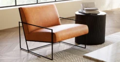 Bo Lounge Chair -Poly and Bark LR A5512 TAN BoLoungeChairinCognacTan Lifestyle1 2980x1500px scaled