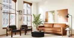 Deja 35" Round Coffee Table With Storage -Poly and Bark LR C1527 001 Deja35RoundCoffeeTablewithStorageinBlack Lifestyle2 2890x1500px scaled